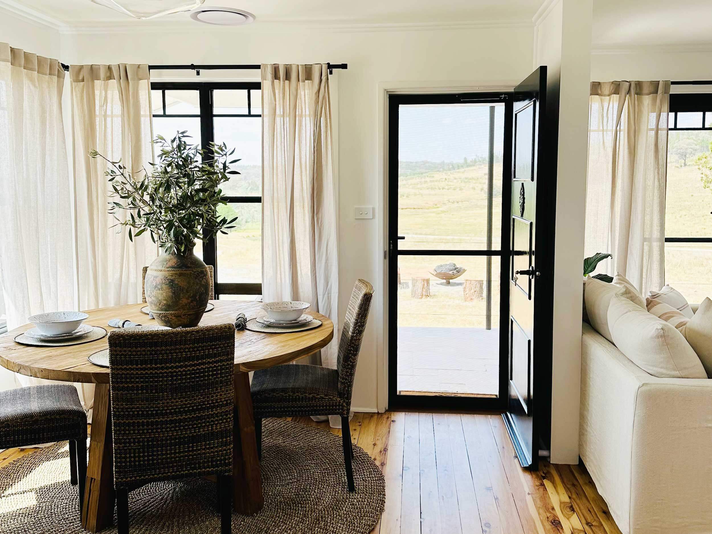View from inside Mulberry Cottage, overlooking the olive groves at Glen Donald Estate, near Cowra and Grenfall, NSW